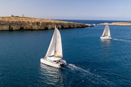 Private full-day Catamaran Trip to Comino and Gozo Islands with Snorkeling and SUP from Suncat Malta Charters.