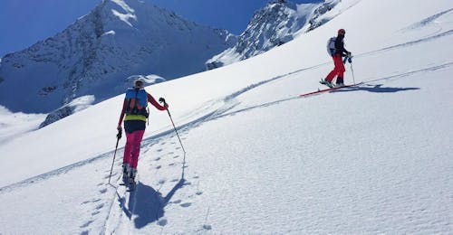 Private Ski Touring Guide for Advanced Skiers from Martin Lancaric Two ski tourers enjoying the snow during the Private Ski Touring Guide for Advanced Skiers from Martin Lancaric.