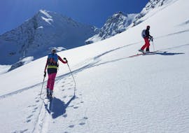 Two ski tourers enjoying the snow during the Private Ski Touring Guide for Advanced Skiers from Martin Lancaric.
