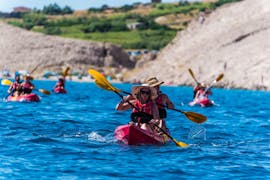 Two people in action during the Sea Kayaking in Pag Bay from Ručica Beach from Sunturist Novalja.