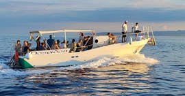 Giro in barca serale lungo la baia di Naxos e Taormina con aperitivo con Escursioni Poseidon Messina.