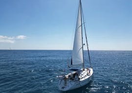 A luxury Sailboat during a sailing Trip in Barcelona with Drinks, Snacks & SUP from Vela Boat Trips Barcelona.
