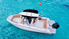 Top view of Emilia private boat within the clear waters of Mallorca with MiniBar&co