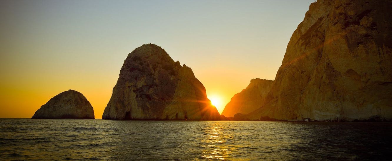 View of Sunset During Sunset Boat Trip to Mizithres & Turtle Island with Wine from Dali Tours Zakynthos.