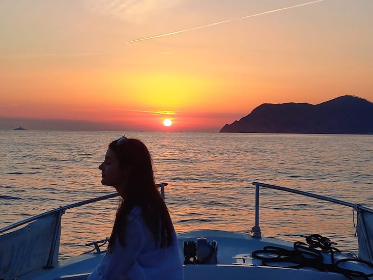 Sunset Boat Trip on a typical Gozzo from Vernazza to Cinque Terre with Aperitif.