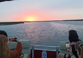 People enjoying the sunset on the boat during the Sunset Islands Tour through Ria Formosa Natural Park from Islands 4 you.