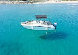 Boat in Blue Water during Boat Rental in Latchi (up to 6 people) from George's Boat Hire Cyprus.