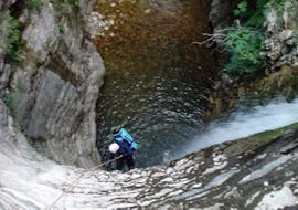 A participant abseiling the Nefeli Gorge during Canyoning in the Nefeli Gorge in Zagori from Via Natura Rafting Zagori.