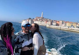 A family enjoying the view on Rovinj during the Sunset Boat Trip from Vrsar to Rovinj from Istra Speed Boat.