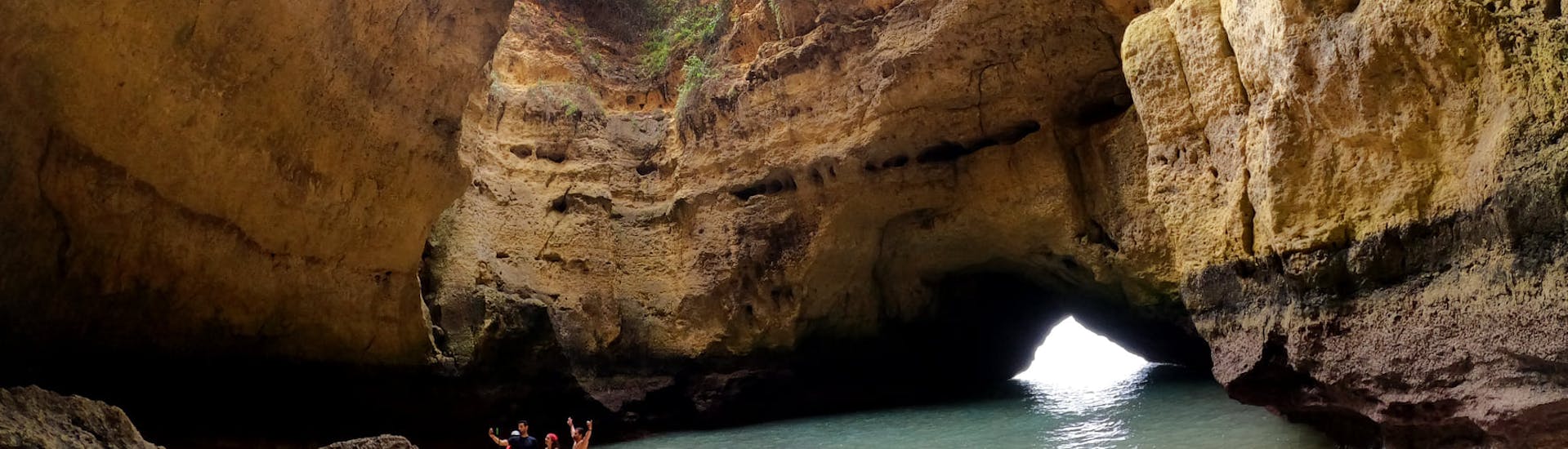 Sea Kayak Tour around Benagil Caves with two people taking a selfie with the great backroundand Praia da Marinha from Ocean 4 fun.