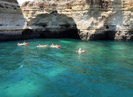 Sea Kayak Tour around Benagil Caves and Praia da Marinha dving with kaykays in the most blue sea from Ocean 4  Fun Portimão.