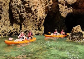 People in the kayak during the Sea Kayak Tour at the Ponta da Piedade from Days of Adventure Algarve.