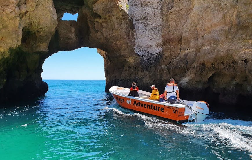People on a small boat during the Boat Trip to Ponta da Piedade.