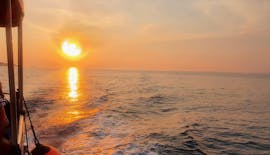 The sun is setting while doing a Sunset Boat Trip from Fažana to the Seagulf Caves with Dolphin Watching from Rea Excursion Fažana.
