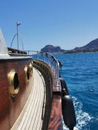 Gita in barca di mezza giornata lungo la costa di Cefalù con aperitivo e snorkeling con Mare aperto Cefalù.