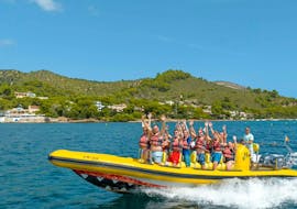 People waving during a Speedboat Trip from Alcúdia to Alcanada Island and Coll Baix from My Sea Experience Alcúdia.