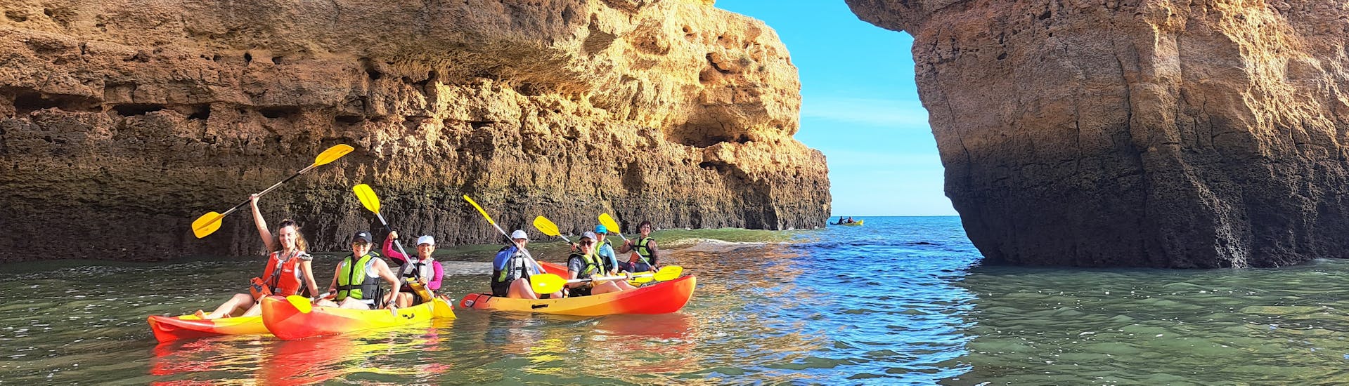 A group enjoying our Kayak & Trekking Tour to Benagil Caves & Marinha Beach from Albandeira Beach with Albandeira Ecotours.
