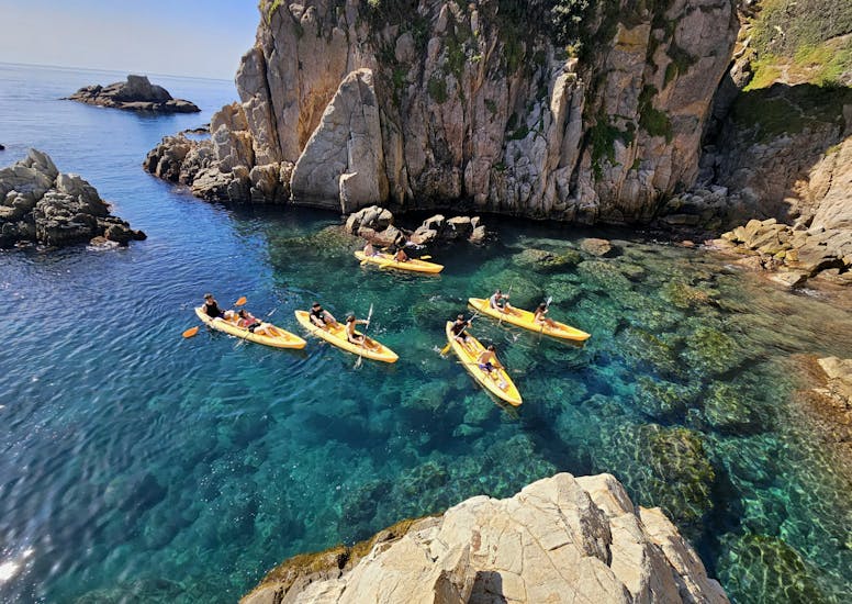 Sea Kayak Tour with several people around the amazing Blanes coves with snorkeling. with  Crystak Kayaks Blanes