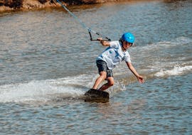 A child who is participating in the wakeboarding lessons in Lagos from Wake Park Lagos.