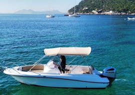The Marion 200cv motorboat during a Boat Rental in Pollença (up to 9 people) from Nautical Experience Pollença.