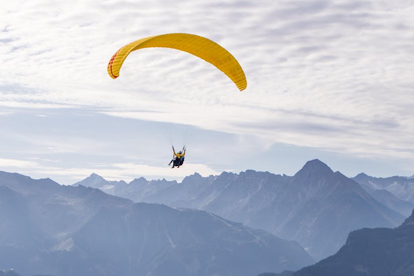 Paragliding in front of the Zillertal Alps with Tandem Paragliding from Penken in Zillertal.