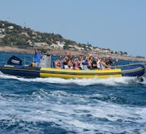 A boat full of people smiling during the Boat Trip in Thau and along Sète Coast from Cap Caraibes Sète.
