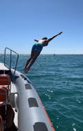 Man jumping in the water during his RIB Boat Trip from Le Cap d'Agde with Wine & Swimming from Cap Liberté 34 Cap d'Agde.