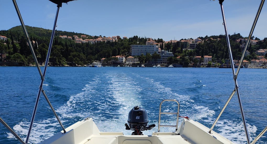 Image from the back of a rented boat from Cavtat Rent a Boat, showing Cavtat in the background.