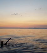 A picture of a woman in the sea during a Sunset boat trip from Saint Cyr sur Mer with Apéritif from Cap Sud Horizon Saint-Cyr-sur-Mer.
