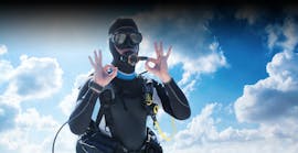 A diver doing the "I am okay" sign on the beach during the Trial Scuba Diving in Halkidiki for Beginners from Triton Scuba Club Halkidiki.