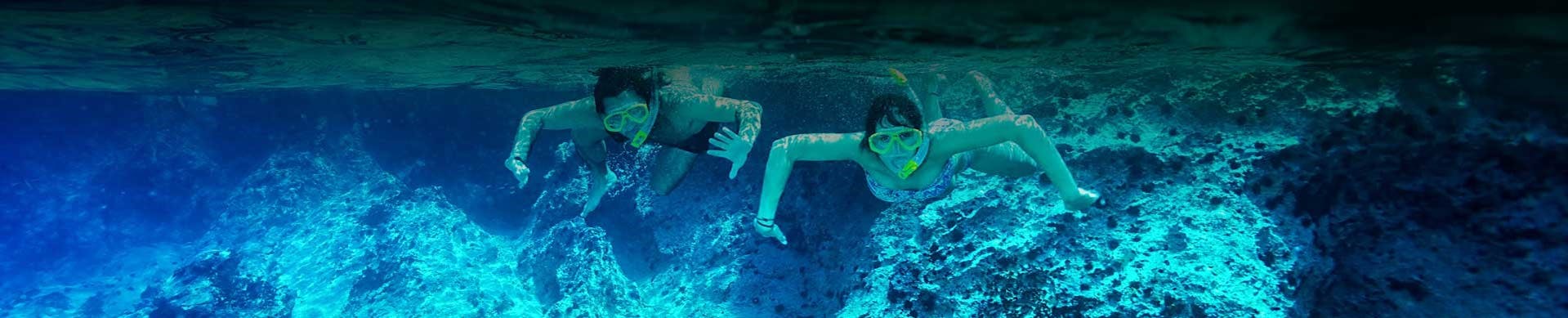 Two people snorkeling during Snorkeling Trip in Halkidiki from Triton Scuba Club Halkidiki.