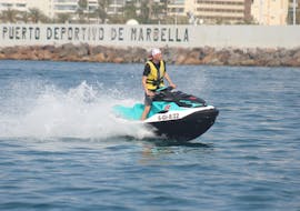 A group of friends on their jet skis during a Jet Ski in Marbella with License from Rental Boat Marbella.
