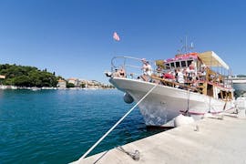 A boat anchors at the harbour during the Boat Trip to Lopud & Elafiti Island with Lunch & Swimming Stops organized by Boats Tours Dubrovnik.