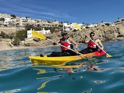 Two people during a Sea Kayak for Beginners in Villajoyosa from Alicante Aventura.
