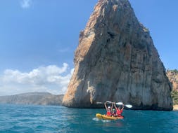 A couple during a Sea Kayak for Beginners to the Javea Coves & Llop Marí Cave from Alicante Aventura.