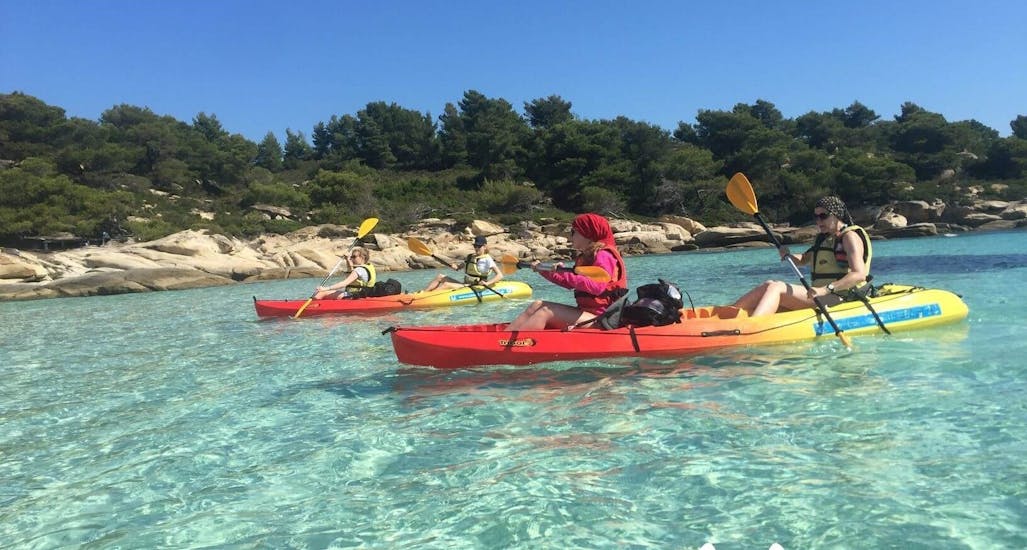 Two kayaks in clear waters during Sea Kayak Tour in Halkidiki with Lunch & Snorkeling by Sea Kayak Halkidiki.