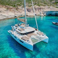 The boat that is used during the Catamaran Trip to Antiparos with Snorkeling and BBQ from Captain Yannis Cruises Catamaran Paros.