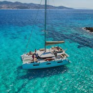 The Catamaran that is used during the Private Catamaran Trip to Naxos and Koufonisi with Snorkeling and BBQ from Captain Yannis Cruises Catamaran Paros.