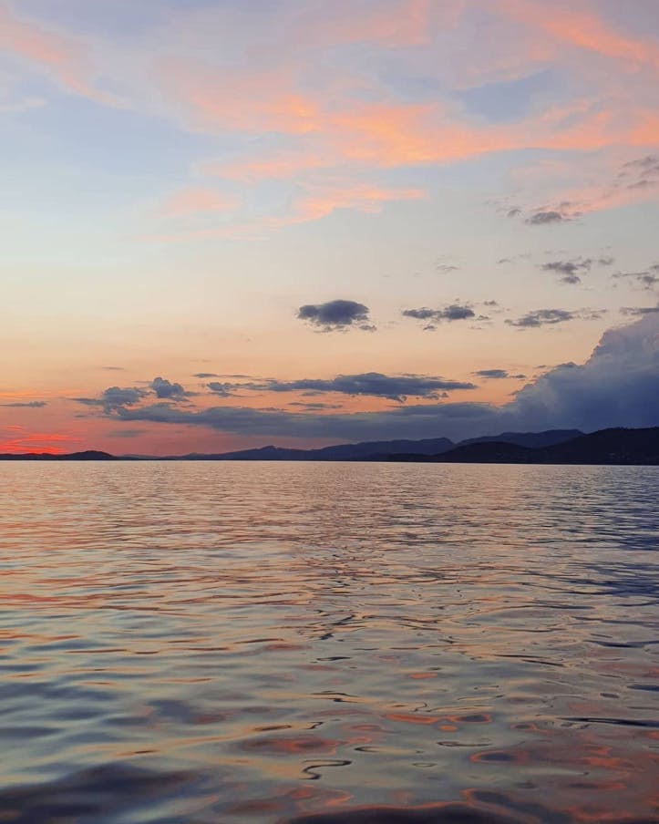 Magnificient view of the water and the sky during the Private Sunset Boat Trip to Porquerolles Islands with swimming stop.