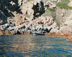 Boat on a Trip to the Gulfs of Girolata and Porto with Snorkeling and Stopover for Lunch from Calvi Promenade en Mer.