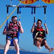 A couple during a Parasailing in Puerto Rico Beach in Gran Canaria from Canary Watersports.