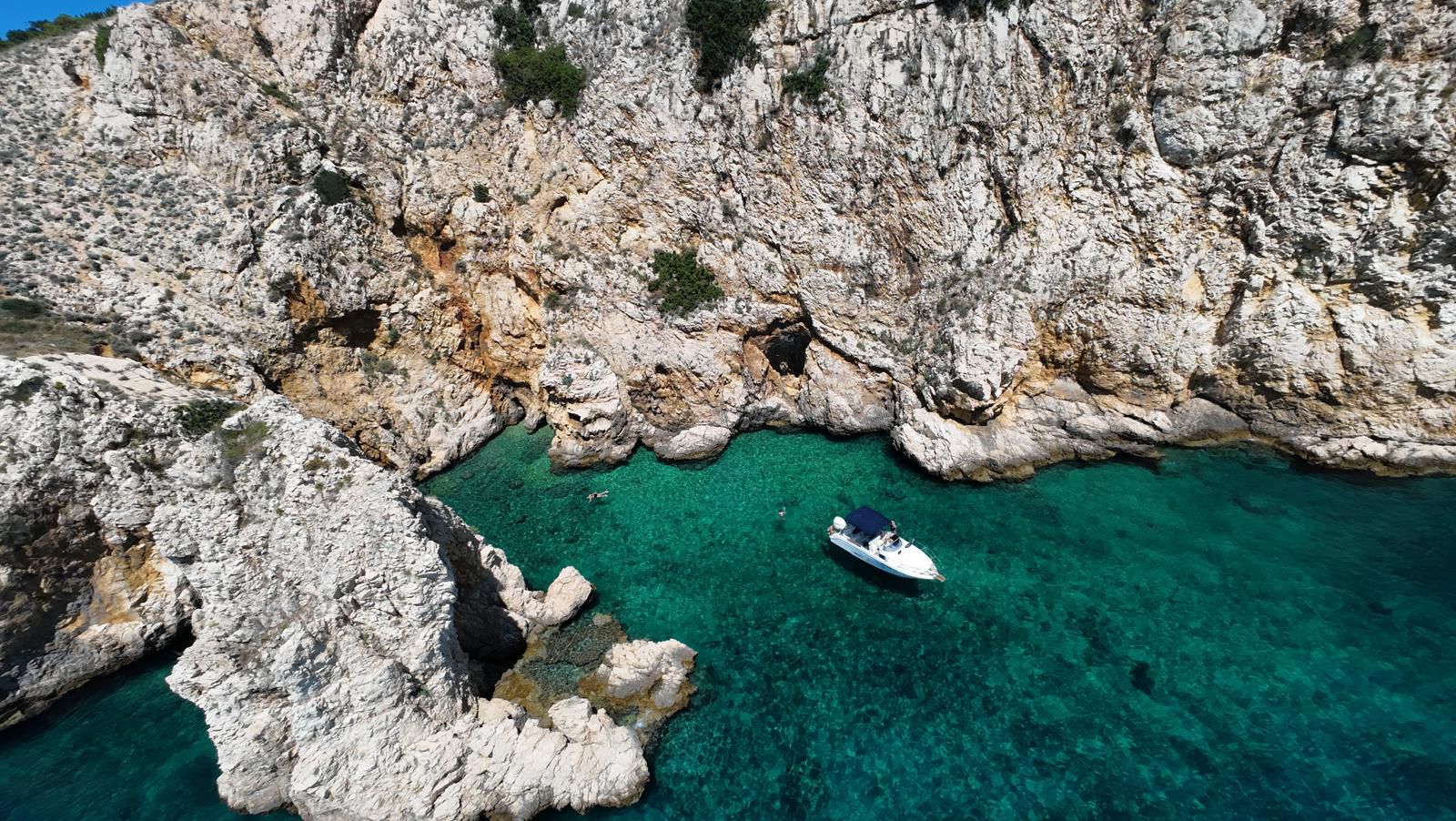 Private Boat Trip from Punat to the Golden Bay Beach from Adriatic Frequencies Punat.