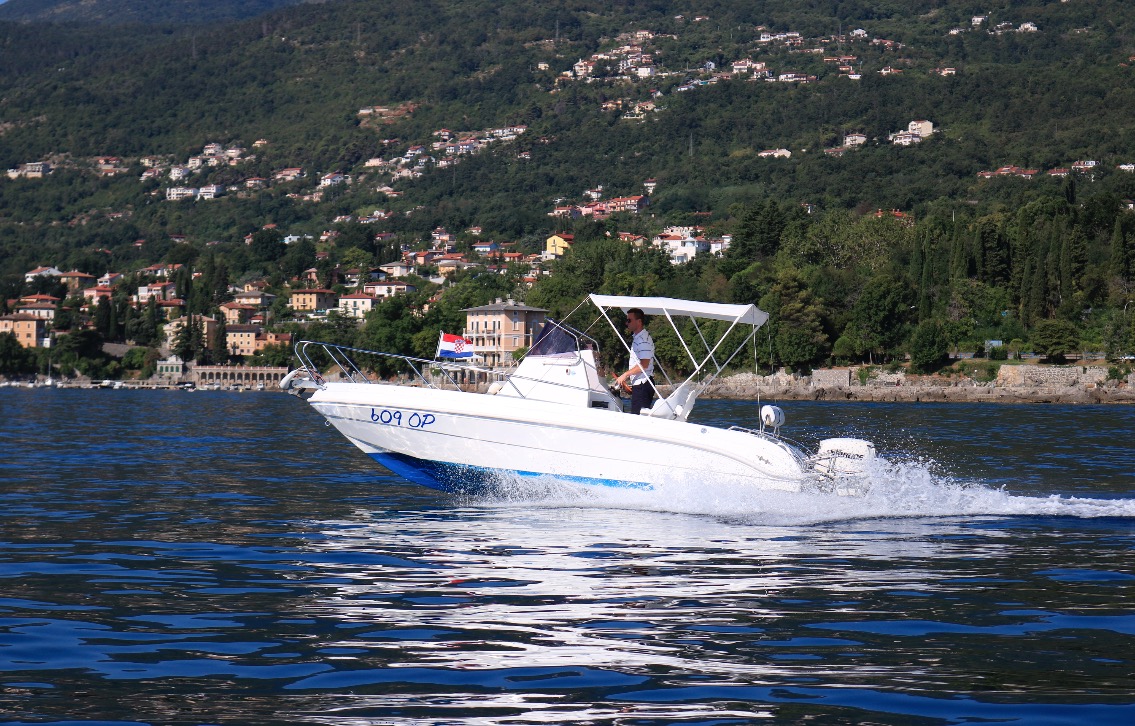 Man enjoying a licensed boat charter in Opatija (up to 7 persons) with Opatija Adventure.
