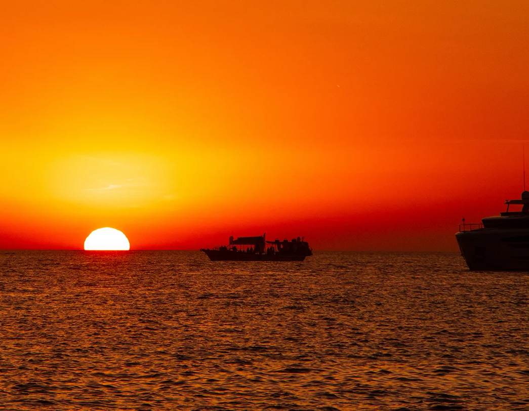 Sunset Boat Trip to Es Vedrà with Swimming Stop from Capitan Nemo Ibiza.