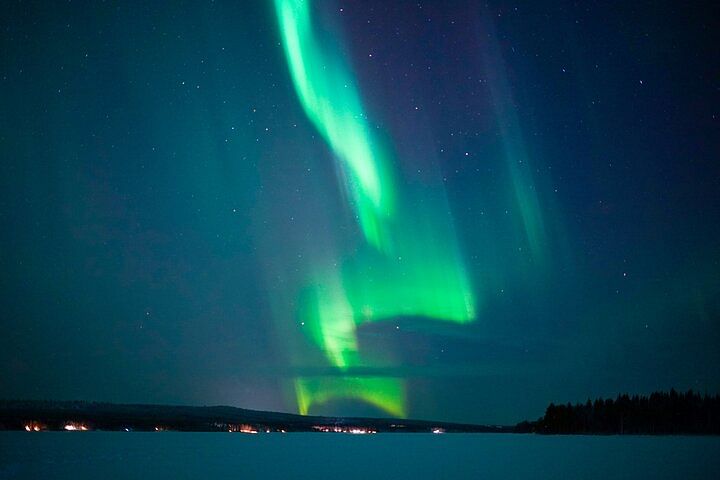 Tour alla ricerca dell'aurora boreale da Rovaniemi con foto, snack e glögg professionali con ToTheNorth Rovaniemi.