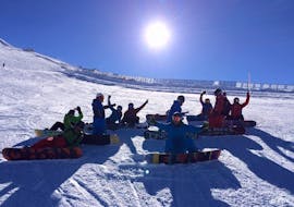 Snowboardlessen voor Kinderen (vanaf 10 jaar) en Volwassenen van Alle Niveaus met Ski School Total Fügen Hochfügen.