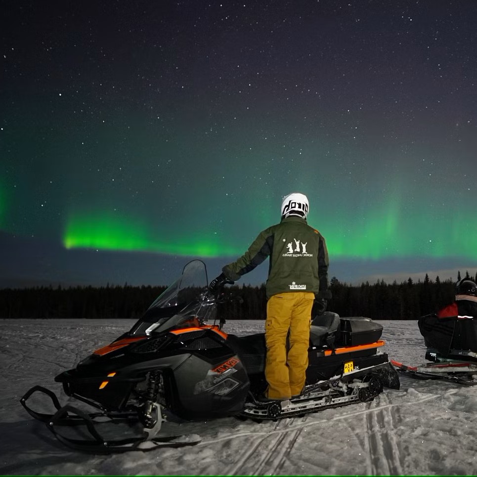 Snowmobile Sleigh Tour with Northern Lights Watching in Rovaniemi from Nordic Unique Travels Rovaniemi.