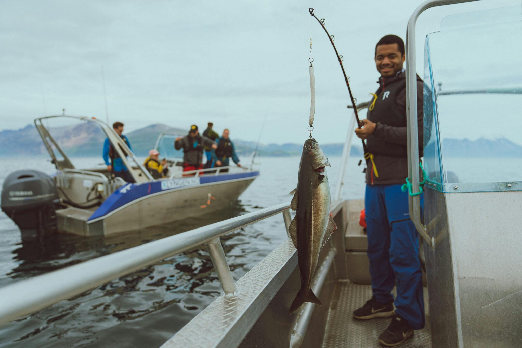 Paseo en barco privado con pesca con Xlyngen.