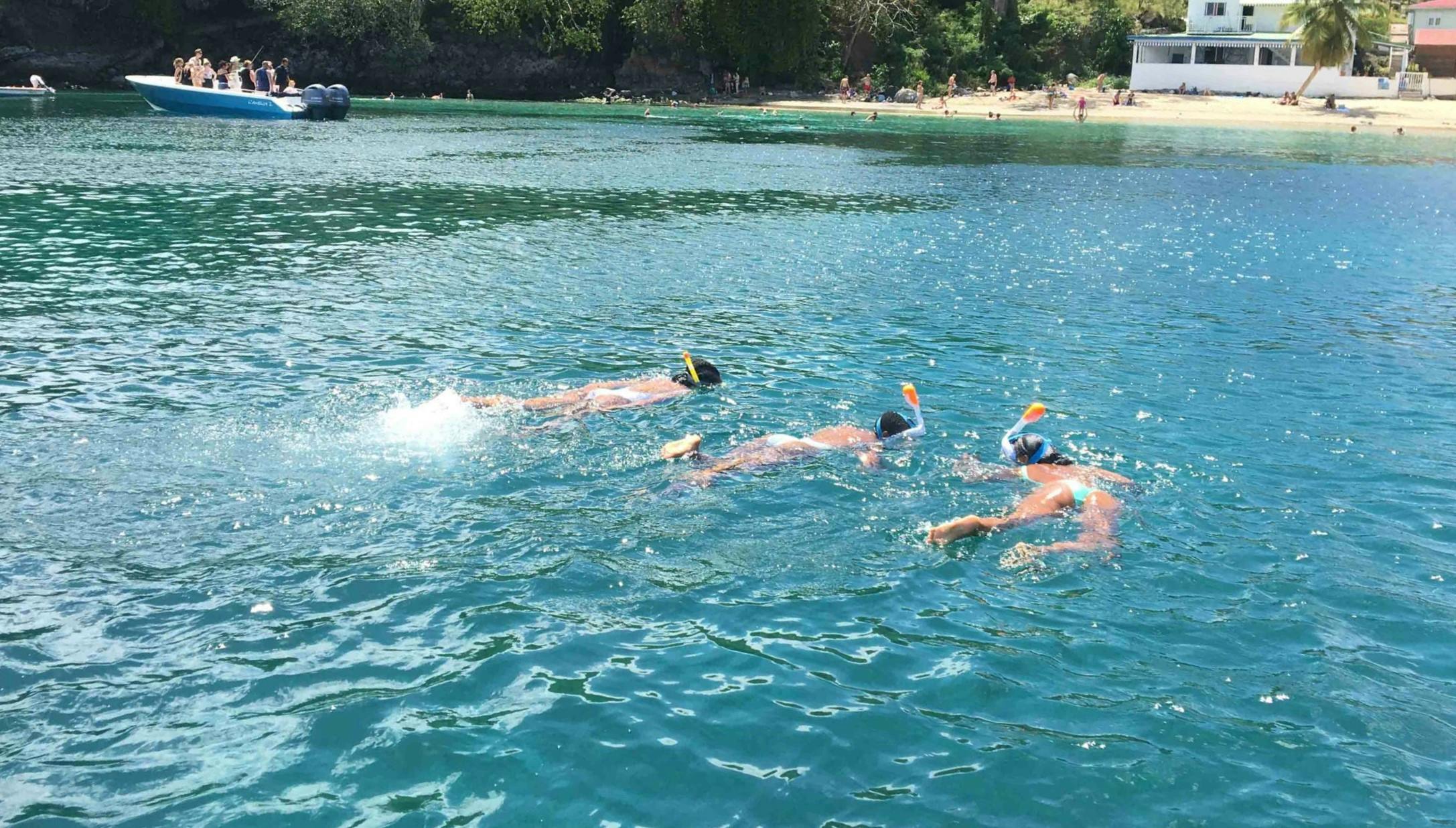 Full Day Private Boat Trip to Les Anses d'Arlet with Turtle Spotting & Drinks from Polo Evasion Martinique.