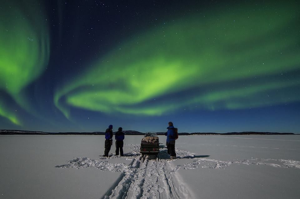 Northern Lights Bus Tour from Kakslauttenen with Snowmobile Sledding, Dinner & Reindeers from Ivalo Safaris.